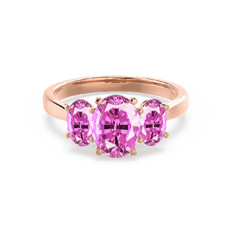 engagement ring with diamond side stones-EVERDEEN - Chatham® Oval Pink Sapphire 18k Rose Gold Trilogy Ring