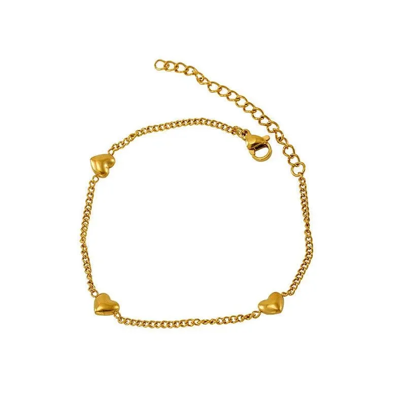 statement bangles for women-Classic Heart Charm Link Bracelet – Elegant Gold Chain