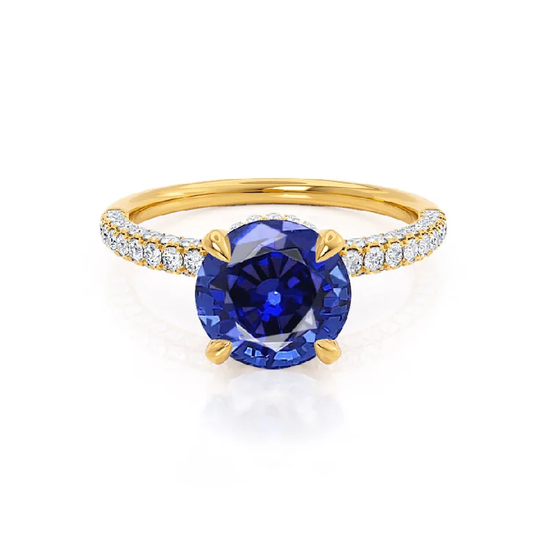 unique wedding engagement rings-COCO- Chatham® Round Blue Sapphire & Diamond 18k Yellow Gold Petite Hidden Halo Triple Pavé Shoulder Set Ring